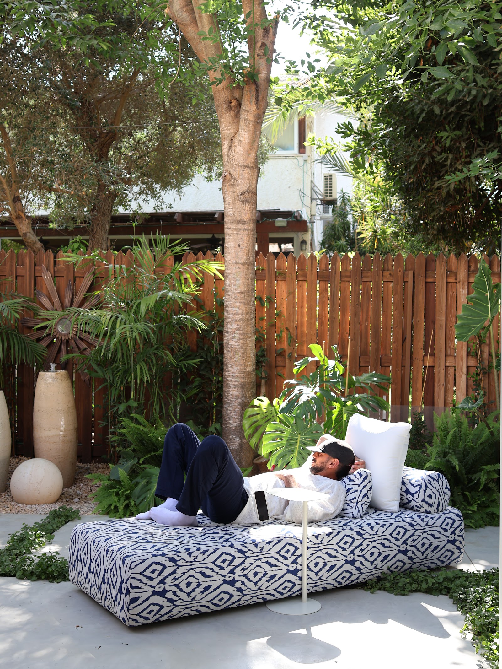White Jungle, daybed resting under the trees